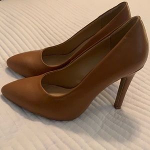 Brown leather pumps. Never been worn. SZ 8
